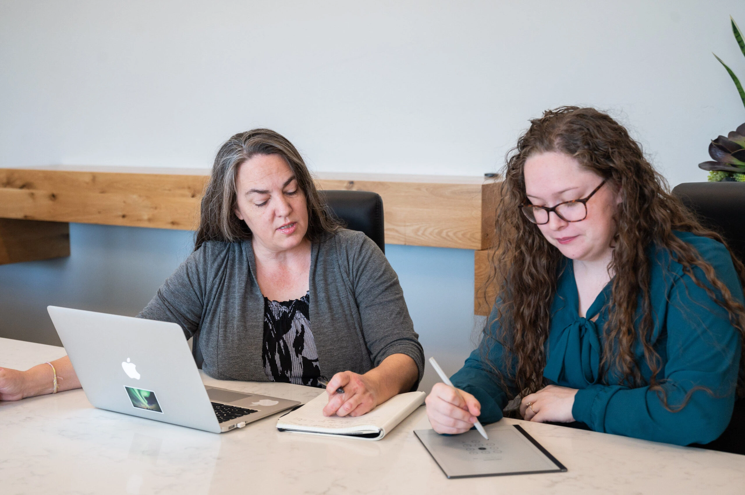 Kaizen Life team reviewing client books and providing bookkeeping support in Nampa ID.
